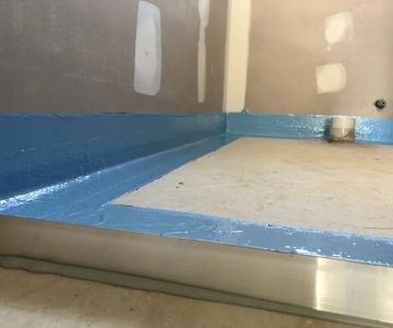 The Importance of Waterproof Underlayment in Bathroom Floor Refinishing