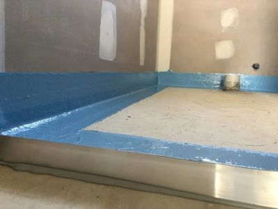 The Importance of Waterproof Underlayment in Bathroom Floor Refinishing