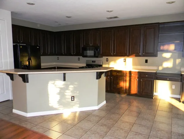 A Revitalized Bath & Kitchen Picture 2