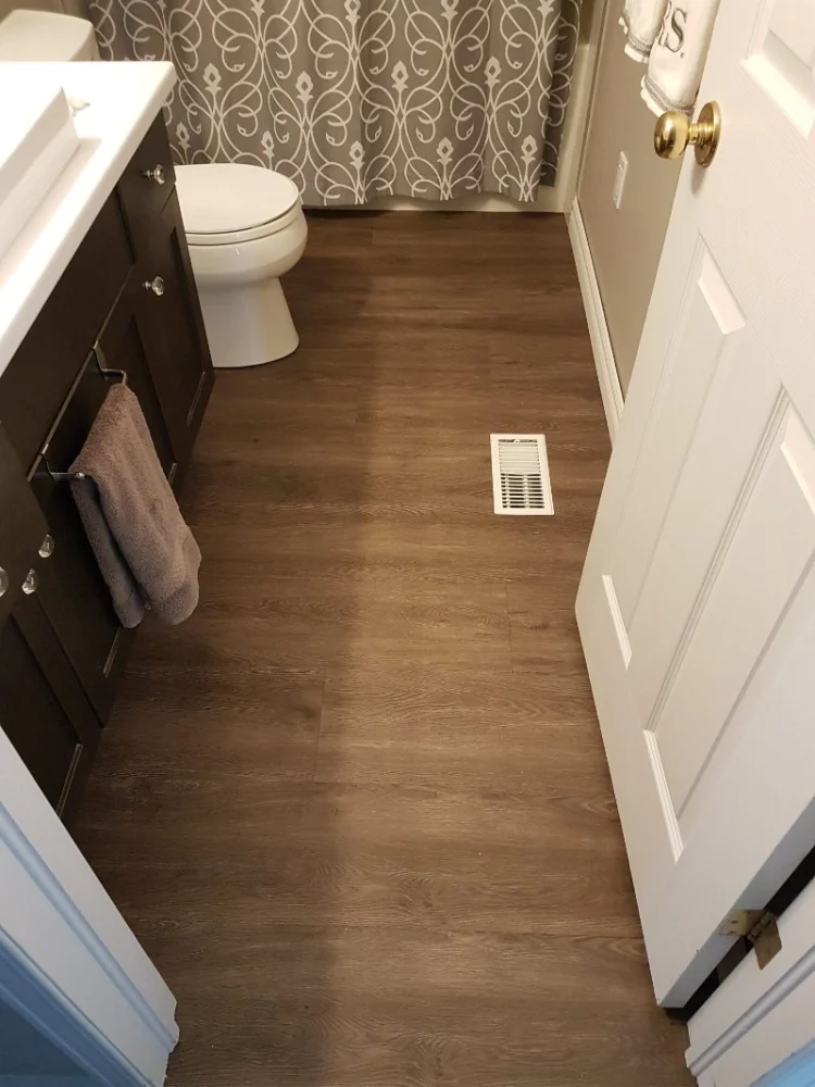 How to Combine Tile and Vinyl Flooring for a Modern, Easy-Maintenance Bathroom