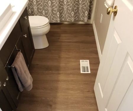 How to Combine Tile and Vinyl Flooring for a Modern, Easy-Maintenance Bathroom