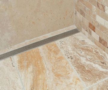 The Importance of Slope and Drainage in Shower Floor Design