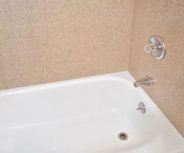 How to Choose Between Tub Refinishing and Tub Replacement Based on ROI