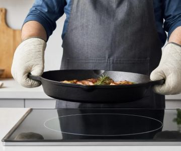 Cast Iron on a Glass Cooktop: Lift, Match the Burner, and Heat Slowly